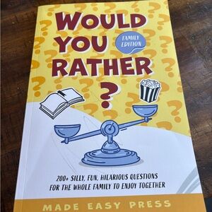 'Would You Rather?' Family Edition Book (little pencil scribble on cover)